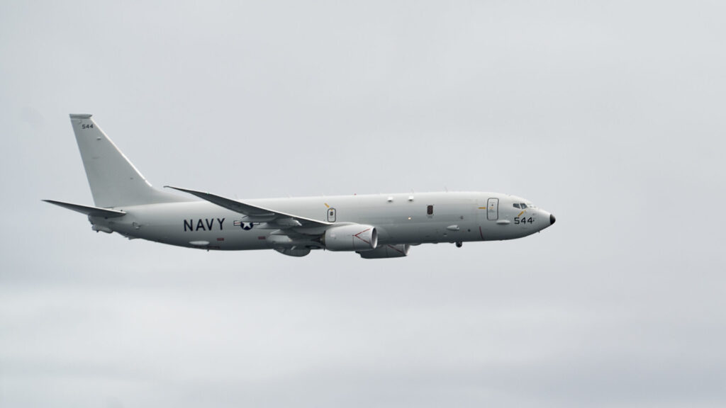 A P-8 Poseidon from the “Golden Eagles” of Patrol Squadron (VP) 9 performs a flyby over Nimitz-class nuclear aircraft carrier USS Carl Vinson (CVN 70). Vinson is en route to San Diego after completing a 17-month scheduled docking planned incremental availability in Bremerton, Washington, during which the ship underwent a complete restoration and a system retrofit to accommodate F-35C Lightning II Joint Strike Fighter mission capabilities. (U.S. Navy photo by Mass Communication Specialist 3rd Class Josiah J. Kunkle/Released)