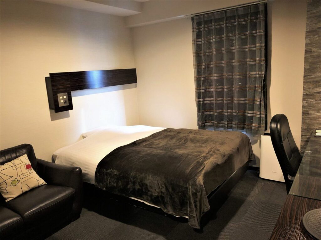 グリーンリッチホテル 岩国駅前 人工温泉・二股湯の華の寝室。